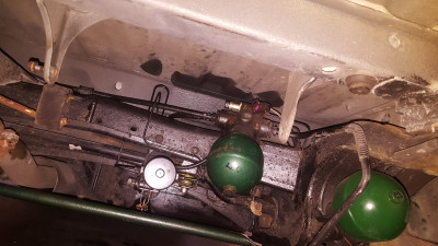 Here is the plugged EV body in place, under pressure - you can see the result of the leaking previous two attempts with the dark patches behind. This final version of the 'plug' has the screw fully tightened against a series of flat washers.