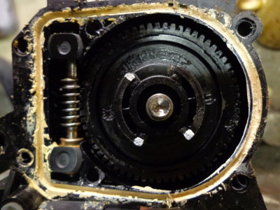 Motor screw drive on left connecting with plastic drive gear