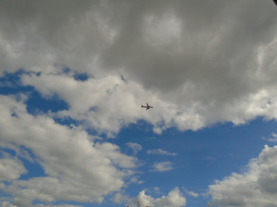 big sky, tiny tiny plane, even smaller passengers
