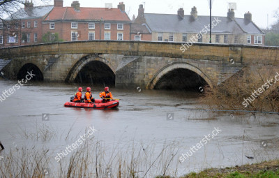 secretary-of-state-for-the-enviroment-liz-truss-visits-tadcaster-north-yorks-where-the-bridge-that-crosses-the-river-wharfe-partially-collapsed-picture-mark-large-30-12-15-shutterstock-editorial-8386201a.jpg