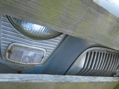 ford prefect jammed against fence