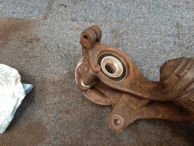 A shiny new bearing in place