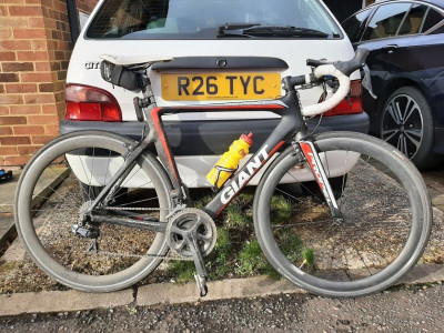 Gratuitous picture of a well-loved bike and car!