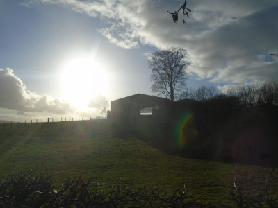 ever attempted to use the sun and the slots on an agricultural building as a diffraction grating?