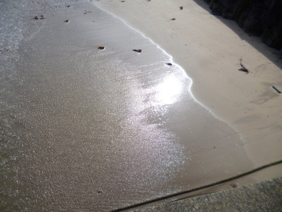 The water running back down the little harbour beach fairly sparkled in the sun<br />possibly not that well captured on the photo