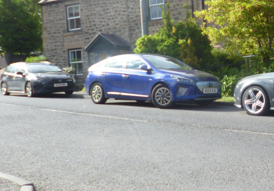The "filled in" Grill tells you its the 100% Electric, the Plug-in Hybrid and Petrol Car with the misleading badge have a more honeycomb style grill.