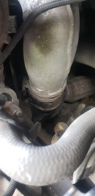 My engine has a section of tube (which definitely looks factory fitted) as opposed to whatever item number 17 is.
