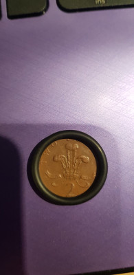 Its also a tiny bit thicker than a 2p
