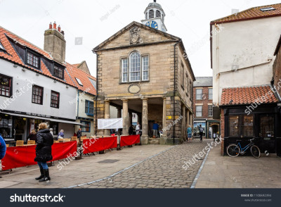stock-photo-the-old-town-hall-in-market-place-whitby-yorkshire-uk-taken-on-may-1100692394.jpg