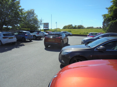 yes it looks black on the photo but it really is a striking orangey bronze metallic.