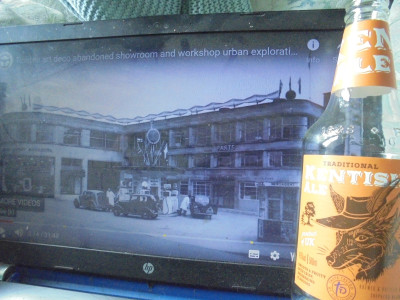 An empty bottle of Kentish Ale<br />and Rootes Group Maidstone's Art-Deco Garage<br />as background, as was in the 1930's.