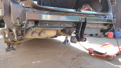 Towbar structure relative to exhaust position