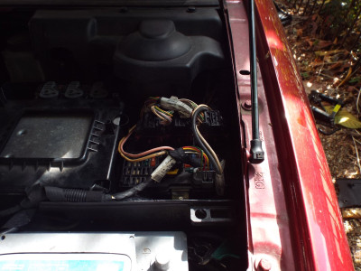 The engine bay fuse box in my C5.  I did not spot the part number.