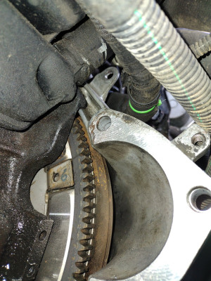 Mystery 6mm hole in flywheel