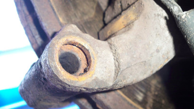 Rusted guide pin bore in calliper yoke