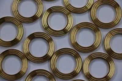 Random picture from the internet, from here: https://www.indiamart.com/proddetail/serrated-copper-washer-23772511973.html