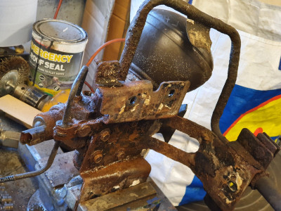 Firmness regulator off with its rusty bracket