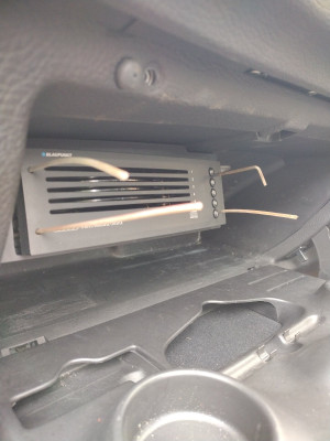 CD changer, single DIN sized. Four rods needed.