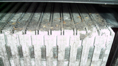 Debris on the evaporator. This was a second hand unit which had been ran without a cabin filter.  Change the filter as required keeps the unit clean regardless of cabin air quality!!