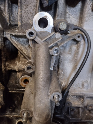 EW10J4 oil filter housing= oh dear. But bolt holes line up