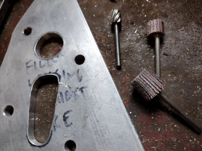Apply Dremel type tool, carbide but then 120 and 180 grit flap wheels