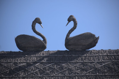 Straw animals<br />The pair of thatcher's models on the western end of the roof of TF0916 : Thatched Cottage. Occasionally called a 'thatcher's dog' or a 'thatcher's dolly' these would once-upon-a-time been a signature, identifying the thatcher for the next decades. But these days they can be bought ready-made, and people ask for a wide variety of models on their roof. In this guise they are sometimes called a "Finial".