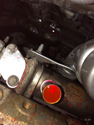 rear ERG cooler pipe target behind the engine