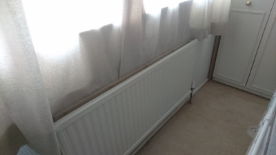 MTMO - The clamp in place holding back the curtains