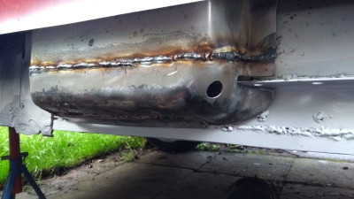 6 strange reinforcement box at base of the B pillar, bisected to allow the shelf angle to continue through. Then reinstated. A couple of large holes added - intended to allow a squirt of waxoil inside here (ah, still not done that!)