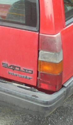 Zoomed in to badges and faded Vs unfaded red parts of tail light cluster