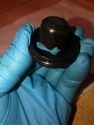 DAMAGED RUBBER CAP