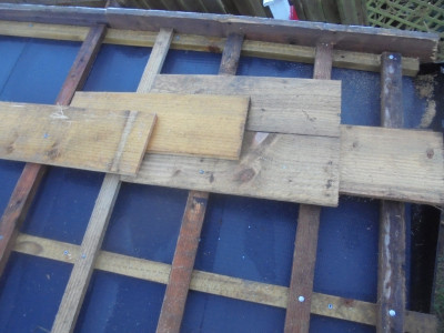 A lot of thought has gone into the temporary positioning, size and fixing of these simple wooden "slates" and the spacing of the battens.