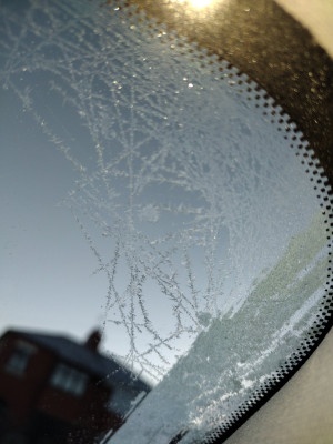 Ice on the inside (outside scraped clean at this point)