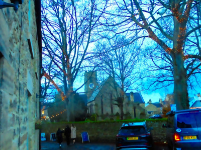 An Audi and St Andrews in colour