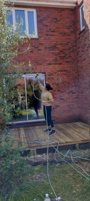 Rinsing with the hose.