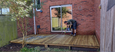 Cleaning the deck of all the crap showered down from the gutter