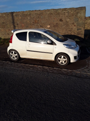 Car back on it's wheels.