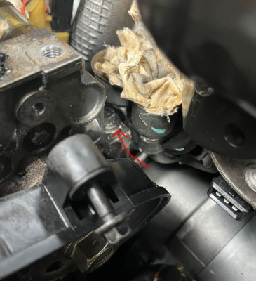 pic #1 - last bolt on pump covered by metal oil separator pipes