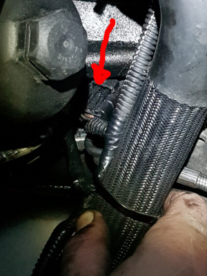 Location of connector under oil filter