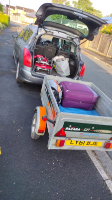 Shown part way through loading up - trailer ended up full of cases, scooter and pram in the boot, so a bit of spare capacity