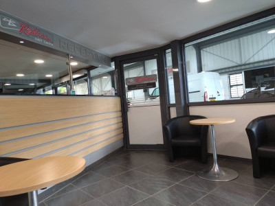 The very decent reception and waiting area for non interested customers.