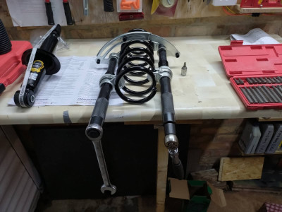 Compressors fitted to the spring and ready to wind up