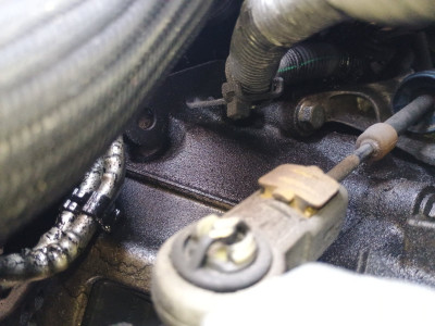 Bell housing bolts, top of gearbox, oily