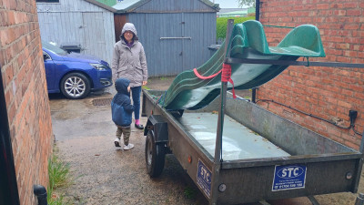 Slide came for a trailer ride, meanwhile wetness fell from the skies!