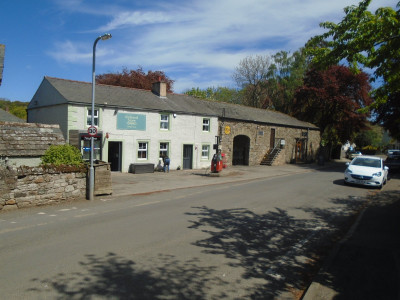 Caldbeck Tithe Barn and AA Village Sign