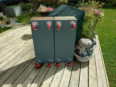 Upended flower boxes with 8 braked wheels!