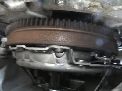 New clutch mounted to flywheel in situ.JPG