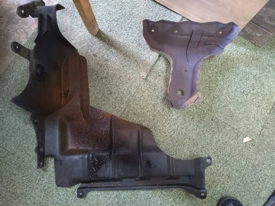 The two covers off the car.