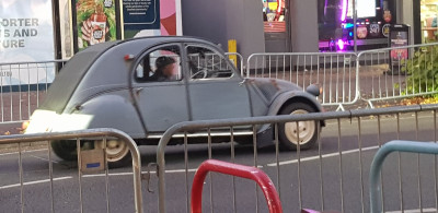 Anyone care to comment on which type of 2cv this is?. Also apart from the bright lights of the following "WhatEverItWas" vehicle I cannot explain the odd light(ing) seen @ the rear of this car. The barriers in the photo are there for a local marathon (the day after this photo was taken).