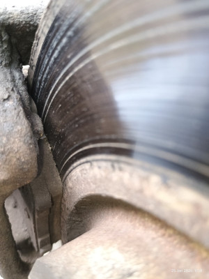 Outer pad thickness (rear, tight)